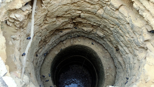 Top view of  deep well without water A top view of  deep well without water